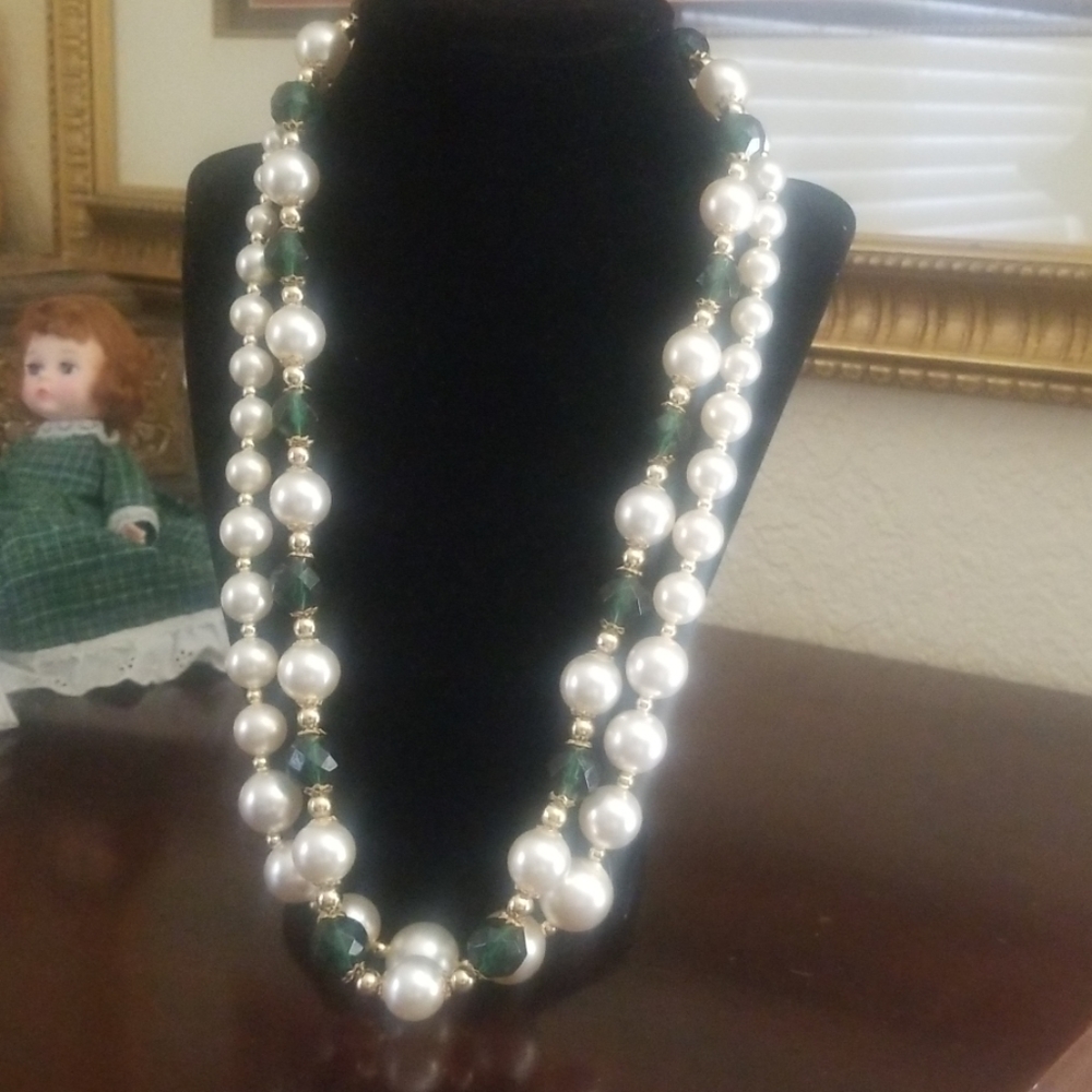 Pearl and green bead necklaces.